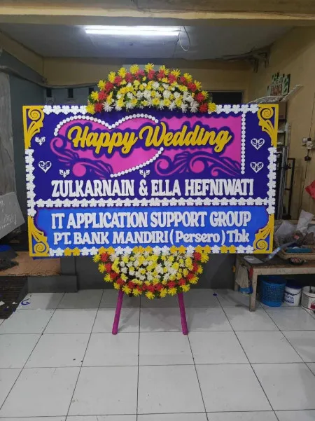 Papan Bunga Tinumpuk Juntinyuat