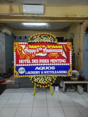 Papan Bunga di Tinumpuk Juntinyuat